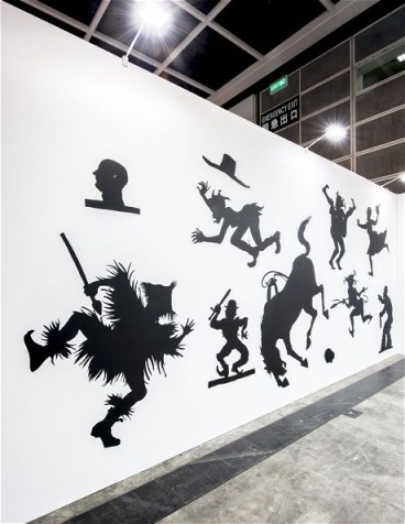 Silhouette stereotypes in Walker's 'Auntie Walker's Wall Sampler for Savages' (2013) (Kara Walker)