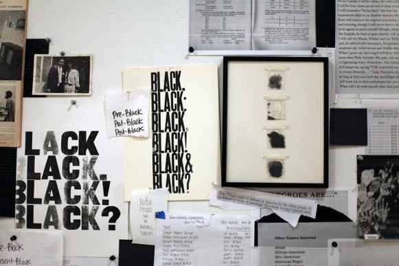 Installation Shot (detail) from No Instructions for Assembly, Activation VII (Variable Dimensions. Found photographs, xerox copied texts, self-authored texts, inkjet prints, woodblock prints, monoprints, newspaper clippings, vintage magazines, vintage books, fabric [felt, faux leather, vinyl, mesh, linen], embroidery thread, stockings, glass, human hair, paper [vellum paper, Japanese rice paper, kraft paper, chalkboard paper, post-it notes) black grocery bags, birch wood panels, black frames)